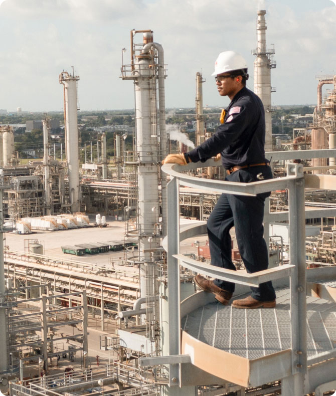 CITGO worker at top of refinery.